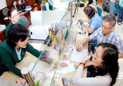 The Government announces that bad debts have reduced to 7 percent in the first quarter 2014 on April 1 (Photo: SGGP) The Government announces that bad debts have reduced to 7 percent in the first quarter 2014 on April 1 (Photo: SGGP)